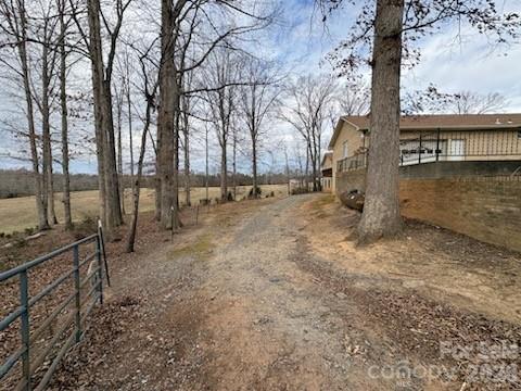 2610 Taylor Road Shelby, NC 28152 - Photo 44 of 47 a backyard of a house with lots of green space