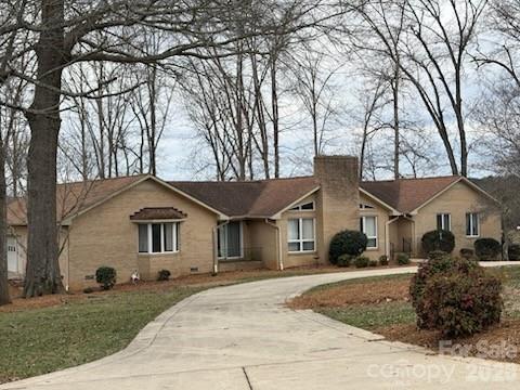 2610 Taylor Road Shelby, NC 28152 - Photo 5 of 47 a front view of a house with a garden
