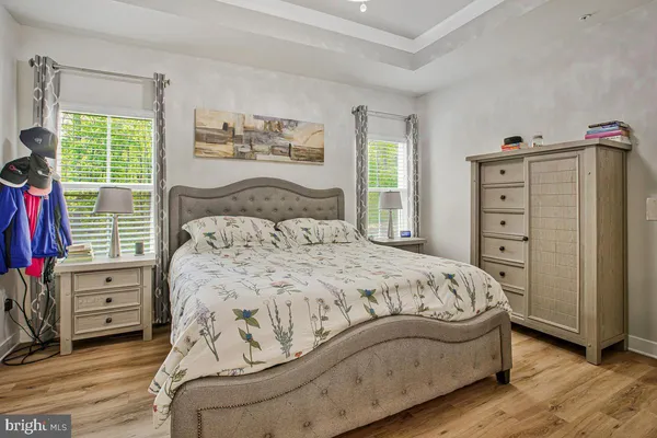 a bedroom with a bed and a closet