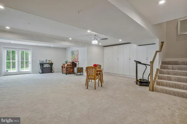 a view of livingroom with furniture and a chandelier