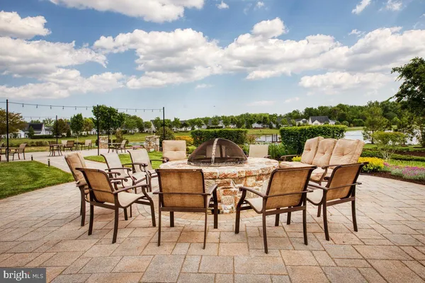 a view of a patio with a backyard