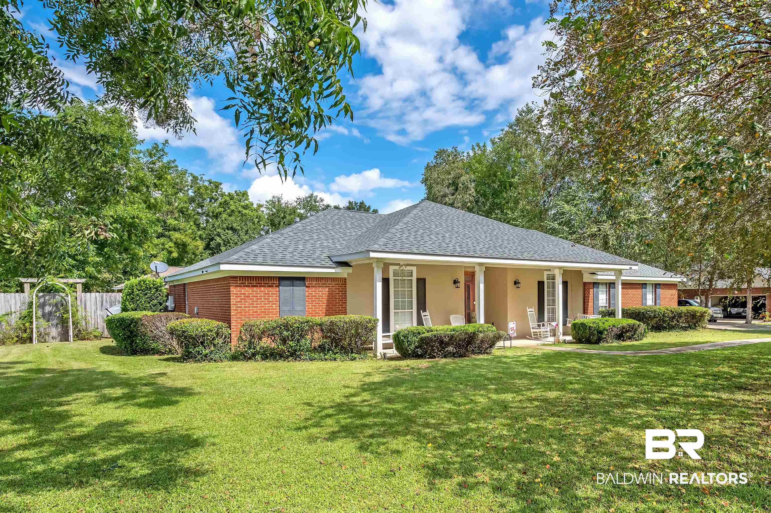 9901 Glover Court Fairhope, AL 36532 - Photo 45 of 52 Ranch-style house with a front yard and covered porch