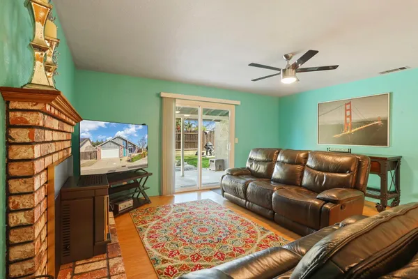 a living room with a couch and a flat screen tv