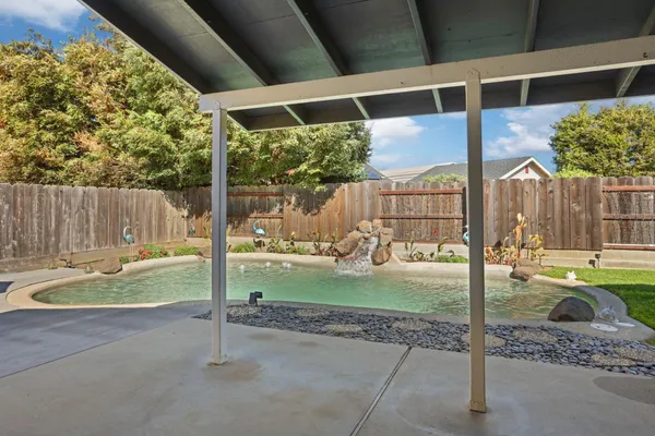 a view of a porch with a yard