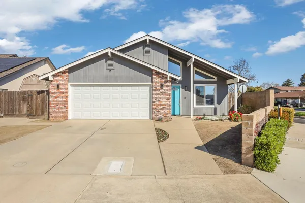 a front view of house with garage