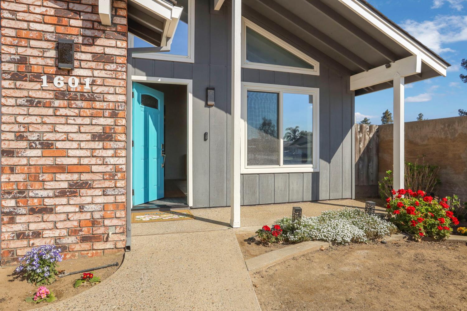 1601 Stanley Drive Ripon, CA 95366 - Photo 5 of 41 a front view of a house