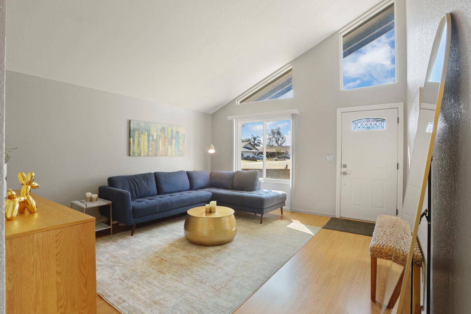 1601 Stanley Drive Ripon, CA 95366 - Photo 7 of 41 a living room with furniture and a window