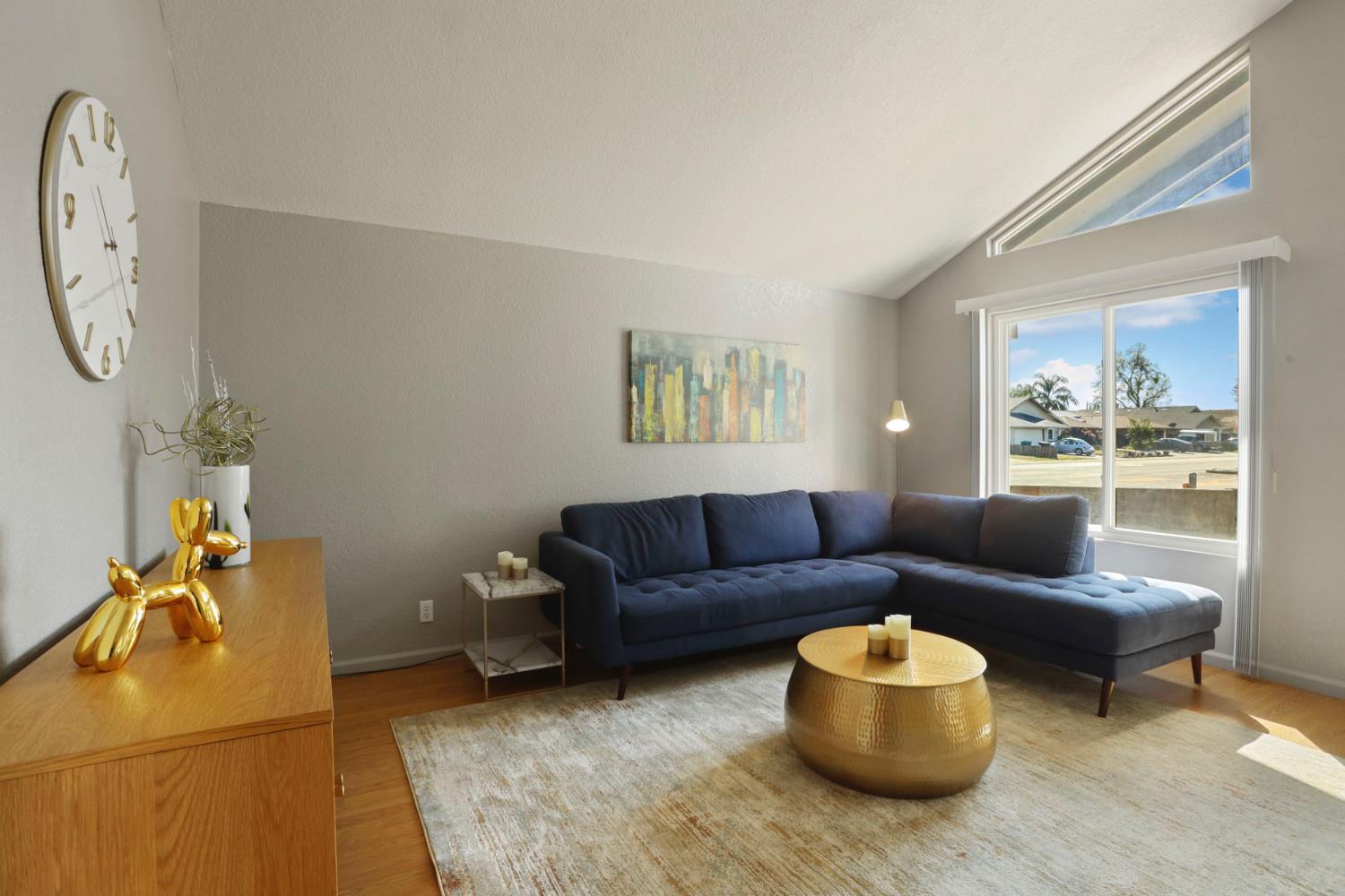 1601 Stanley Drive Ripon, CA 95366 - Photo 8 of 41 a living room with furniture and a window