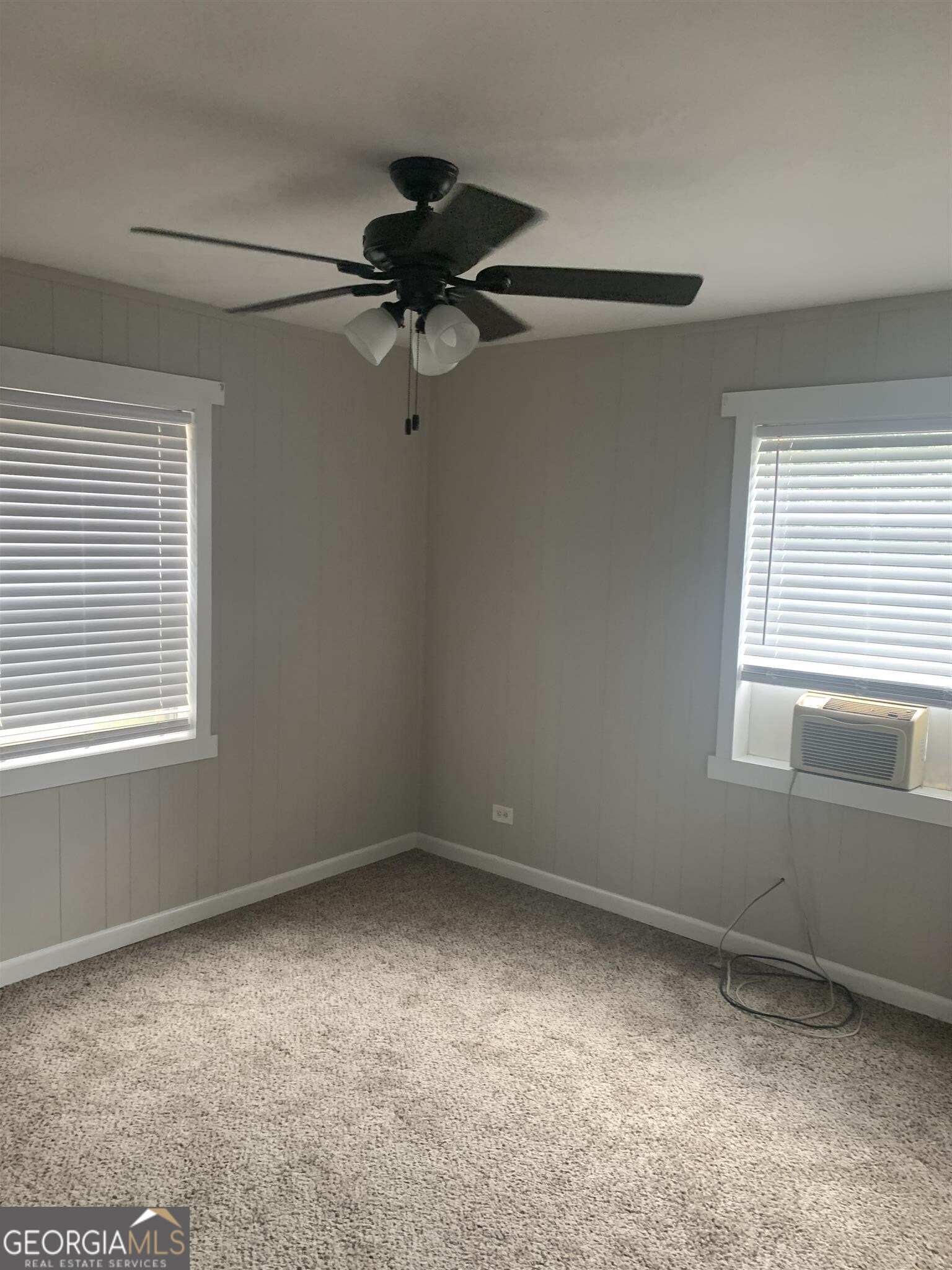 200 Willow Road, Unit 2B Peachtree City, GA 30269 - Photo 7 of 14 an empty room with a window