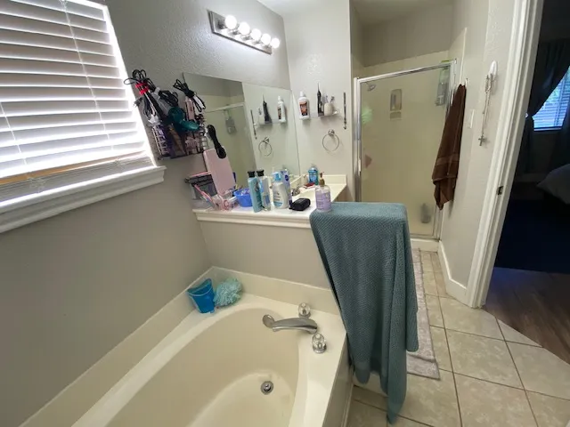 a bathroom with a bathtub sink and toilet