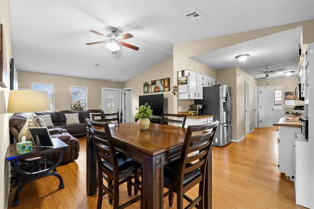 a view of a dining room with furniture