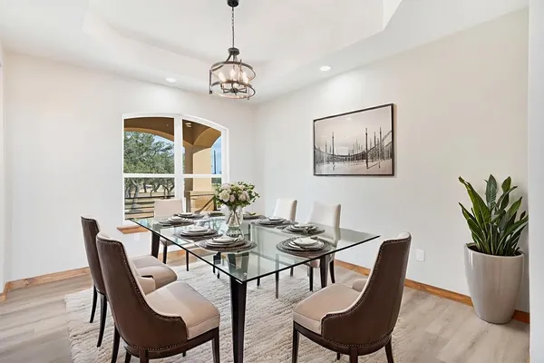 a view of a dining room with furniture window and outside view