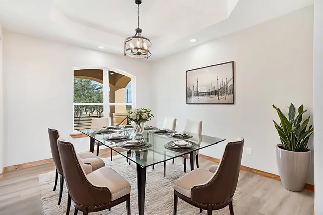 a view of a dining room with furniture window and outside view