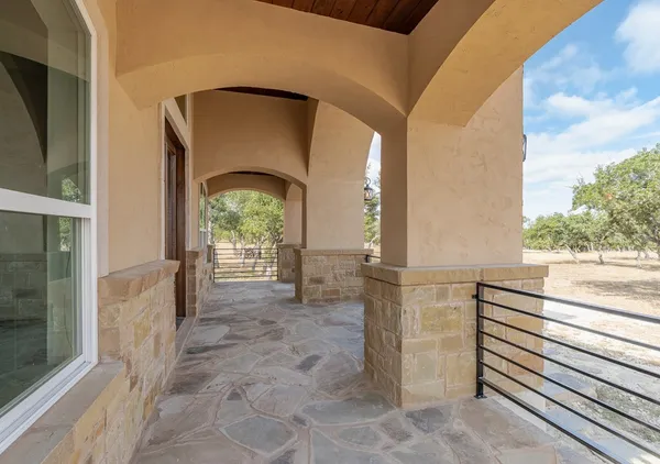 a view of a balcony with an outdoor space