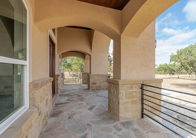 a view of a balcony with an outdoor space