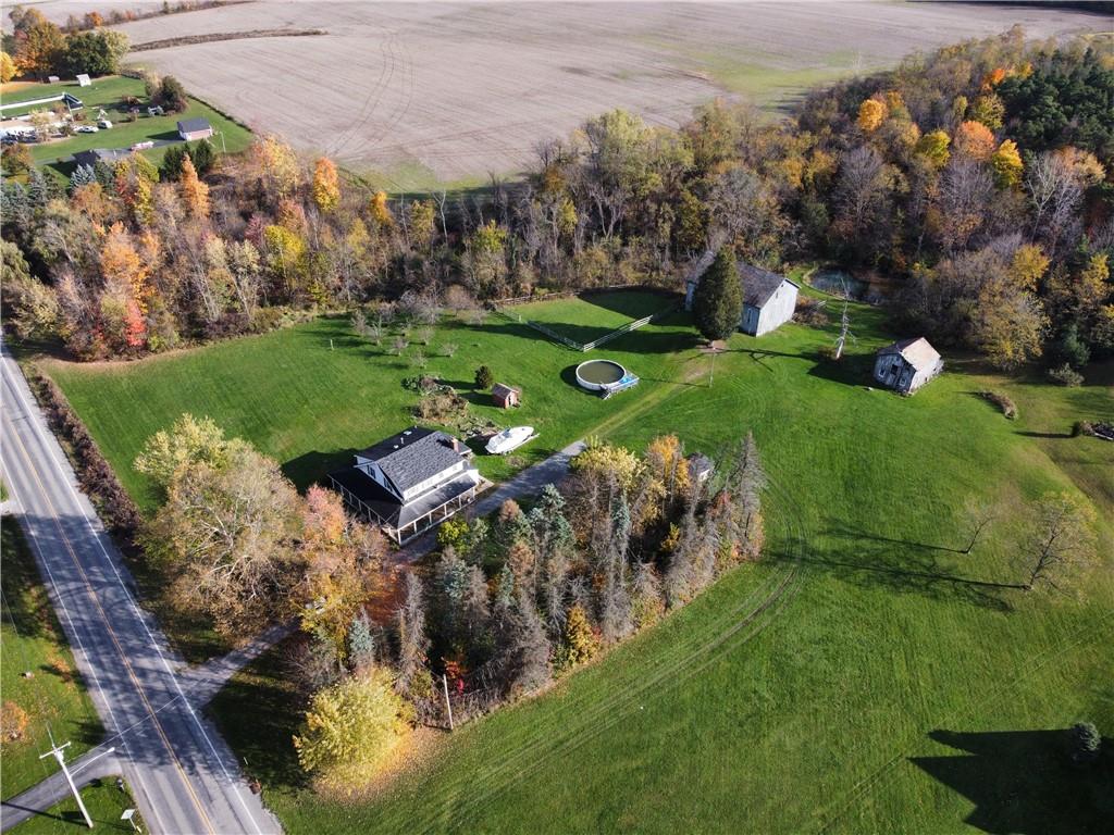 4270 Edinburg Road New Castle, PA 16102 - Photo 23 of 25 a view of a wooden house with a yard