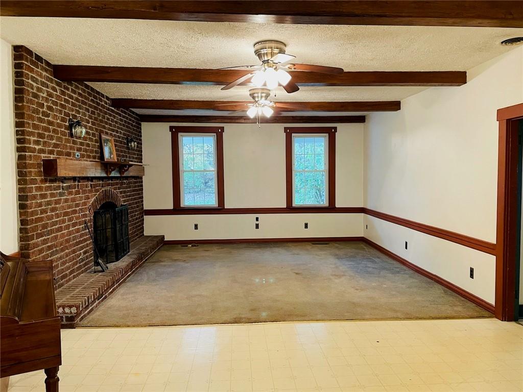 4270 Edinburg Road New Castle, PA 16102 - Photo 10 of 25 a view of a fireplace in the room