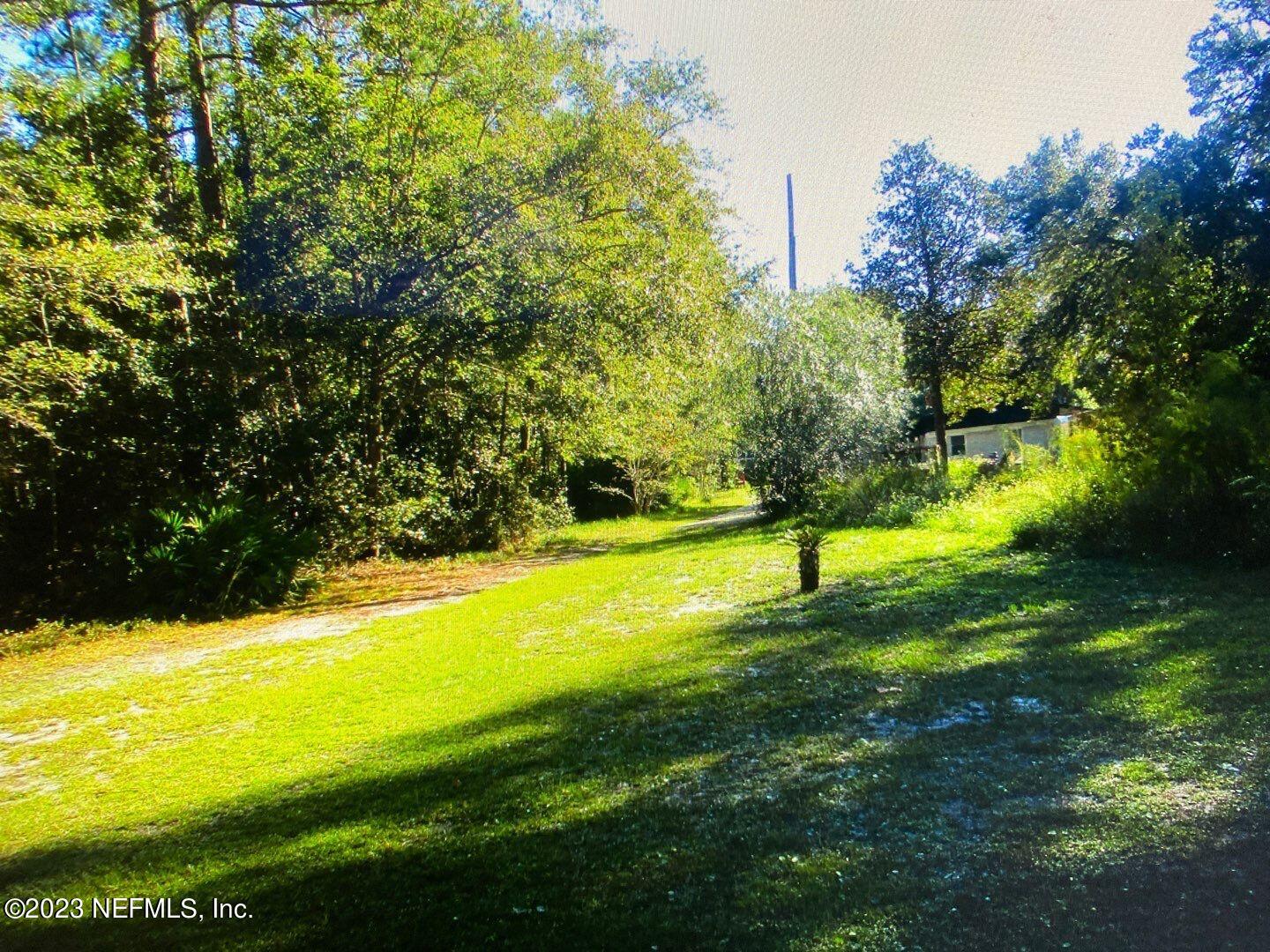 518 Forgotten Way Jacksonville, FL 32221 - Photo 19 of 19 a view of an outdoor space and a yard