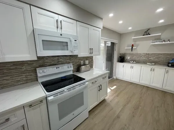 $399,000 | 7669 Springwater Place, Unit 102, Boynton Beach, FL 33437