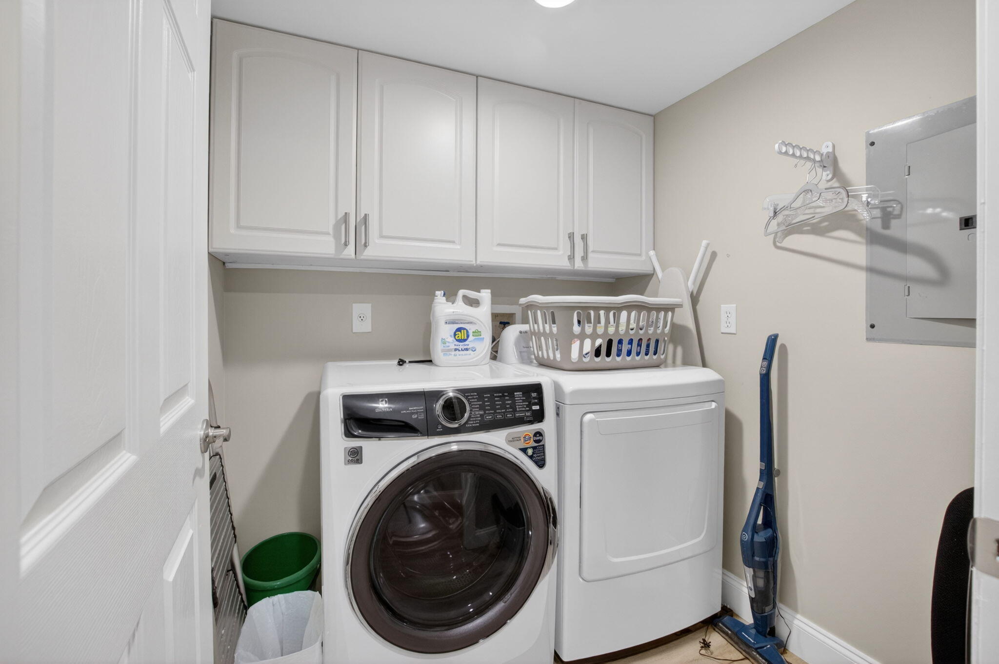 7669 Springwater Place, Unit 102 Boynton Beach, FL 33437 - Photo 30 of 116 a utility room with dryer and washer