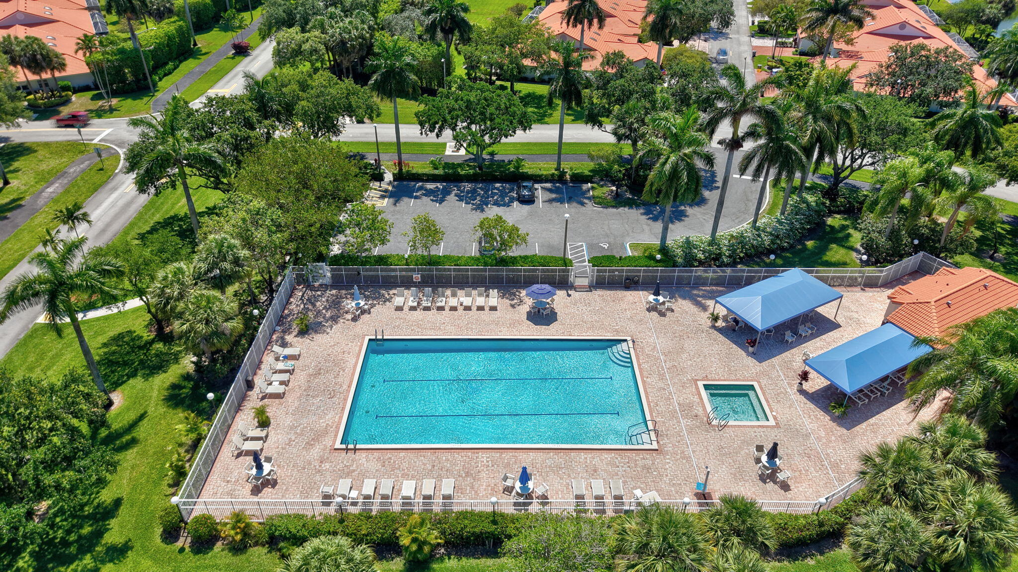 7669 Springwater Place, Unit 102 Boynton Beach, FL 33437 - Photo 51 of 116 an aerial view of a house with garden space and street view