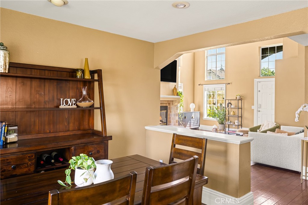 1985 Shady Brook Way Upland, CA 91784 - Photo 16 of 51 a dining room with furniture and a floor to ceiling window