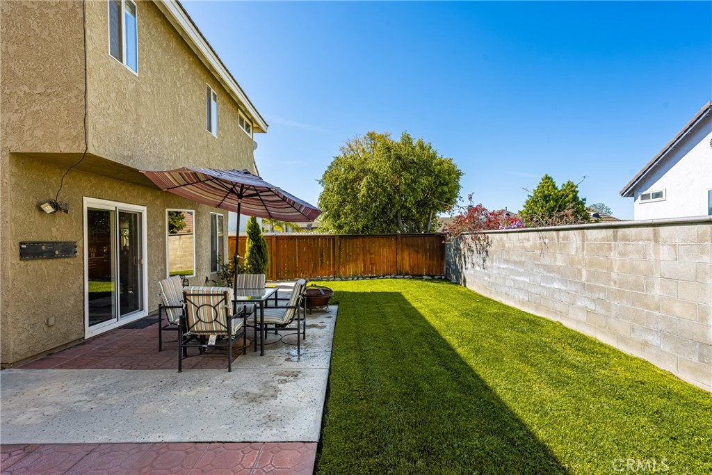 1985 Shady Brook Way Upland, CA 91784 - Photo 19 of 51 a view of backyard with outdoor seating and plants