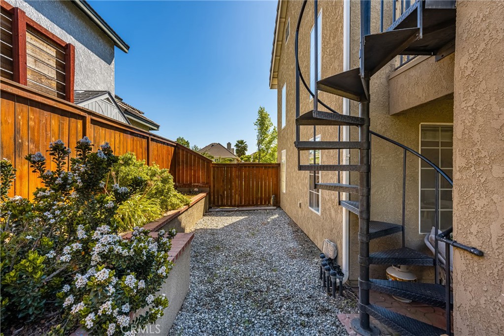 1985 Shady Brook Way Upland, CA 91784 - Photo 23 of 51 a view of a house with a backyard
