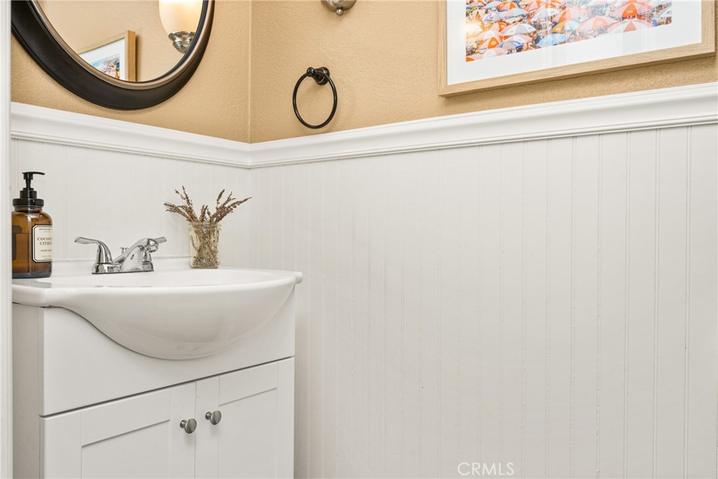 1985 Shady Brook Way Upland, CA 91784 - Photo 25 of 51 a bathroom with a sink and a mirror