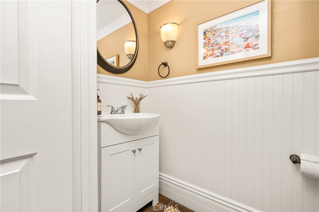 1985 Shady Brook Way Upland, CA 91784 - Photo 26 of 51 a bathroom with a sink and a mirror