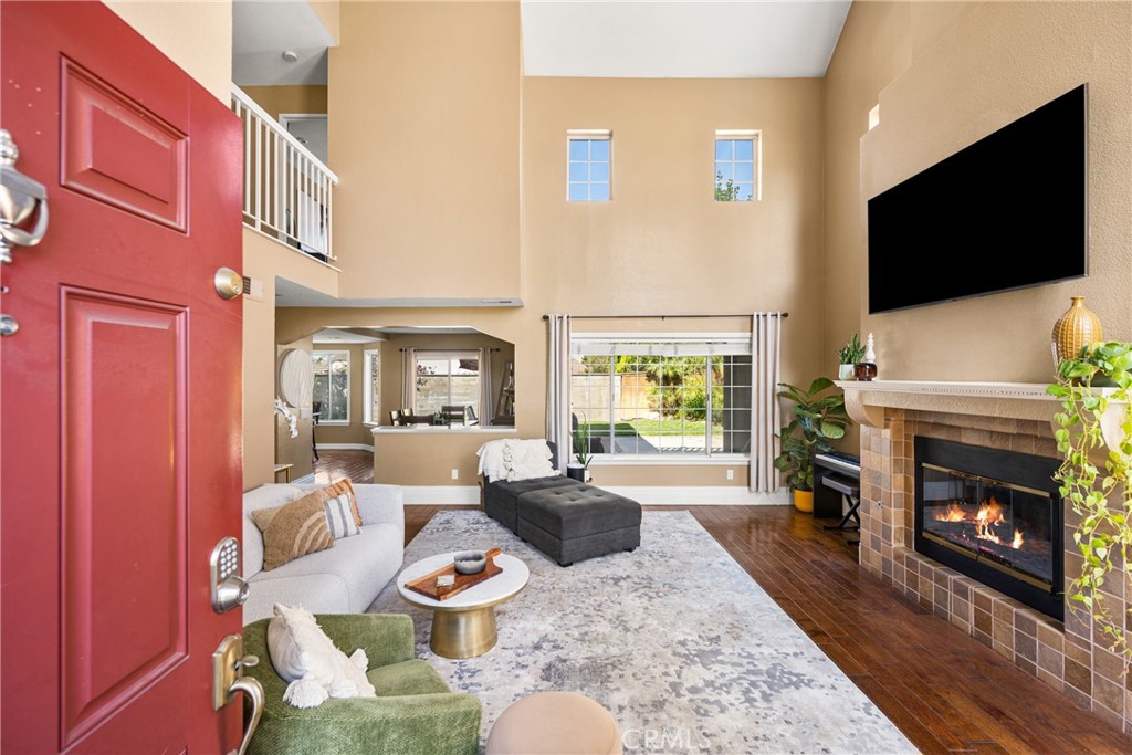 1985 Shady Brook Way Upland, CA 91784 - Photo 3 of 51 a living room with fireplace furniture and a flat screen tv