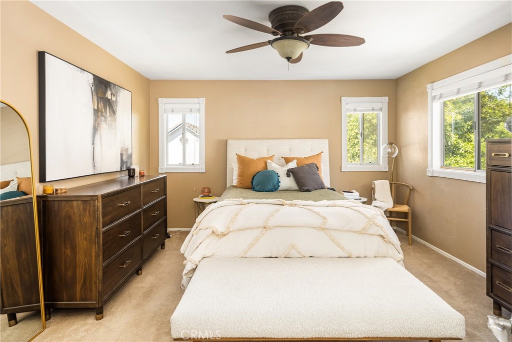 1985 Shady Brook Way Upland, CA 91784 - Photo 31 of 51 a bedroom with a bed and wooden floor