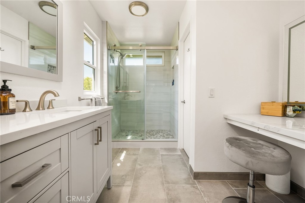 1985 Shady Brook Way Upland, CA 91784 - Photo 36 of 51 a bathroom with a sink and a mirror