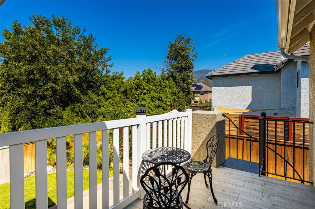 1985 Shady Brook Way Upland, CA 91784 - Photo 38 of 51 a view of a chairs and table in the balcony