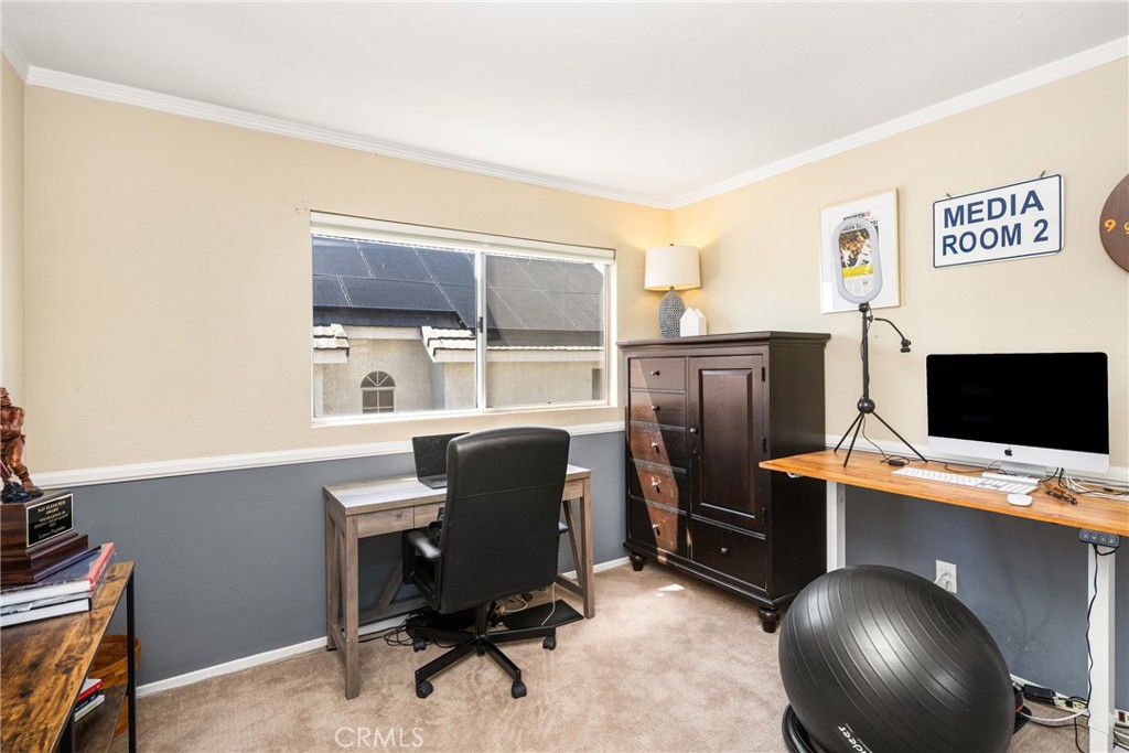 1985 Shady Brook Way Upland, CA 91784 - Photo 42 of 51 a view of a workspace with furniture and a window