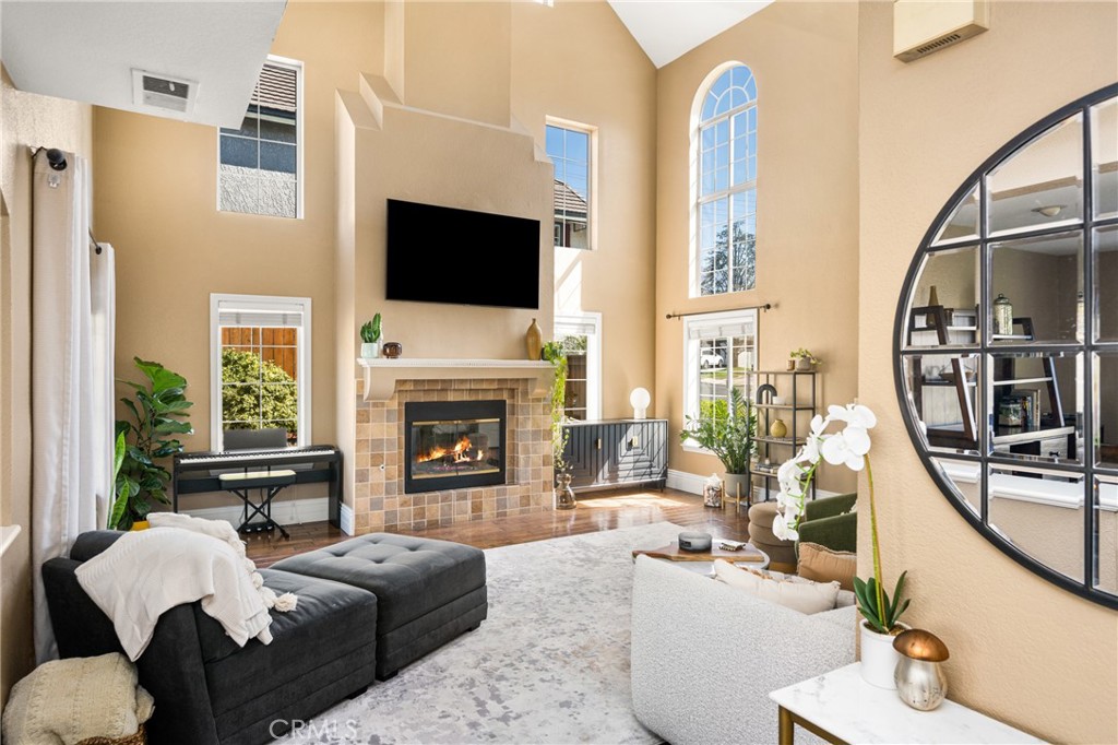 1985 Shady Brook Way Upland, CA 91784 - Photo 6 of 51 a living room with furniture fireplace and flat screen tv