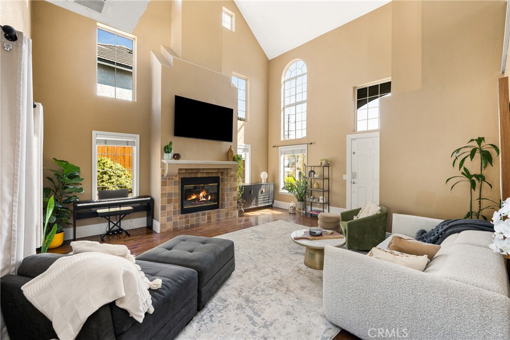 1985 Shady Brook Way Upland, CA 91784 - Photo 7 of 51 a living room with furniture fireplace and a flat screen tv