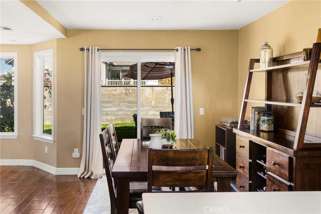 1985 Shady Brook Way Upland, CA 91784 - Photo 8 of 51 a view of a dining room with furniture window and wooden floor