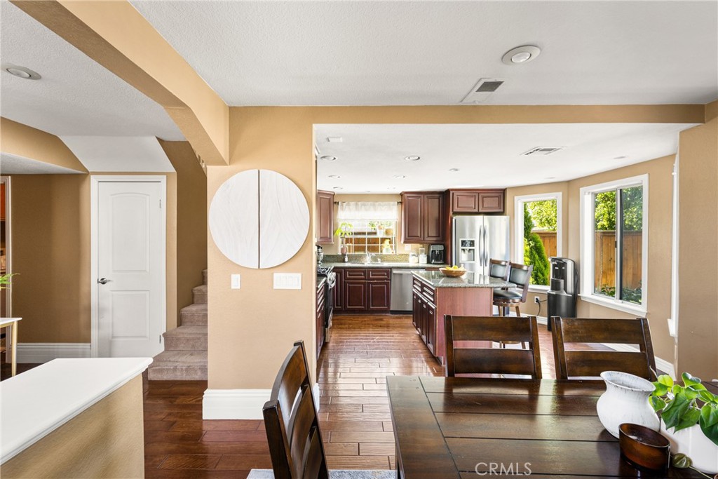 1985 Shady Brook Way Upland, CA 91784 - Photo 10 of 51 a living room with furniture a fireplace and a potted plant