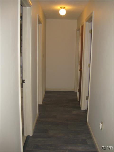 358 Blue Ridge Road Saylorsburg, PA 18353 - Photo 14 of 43 a view of a hallway with wooden floor