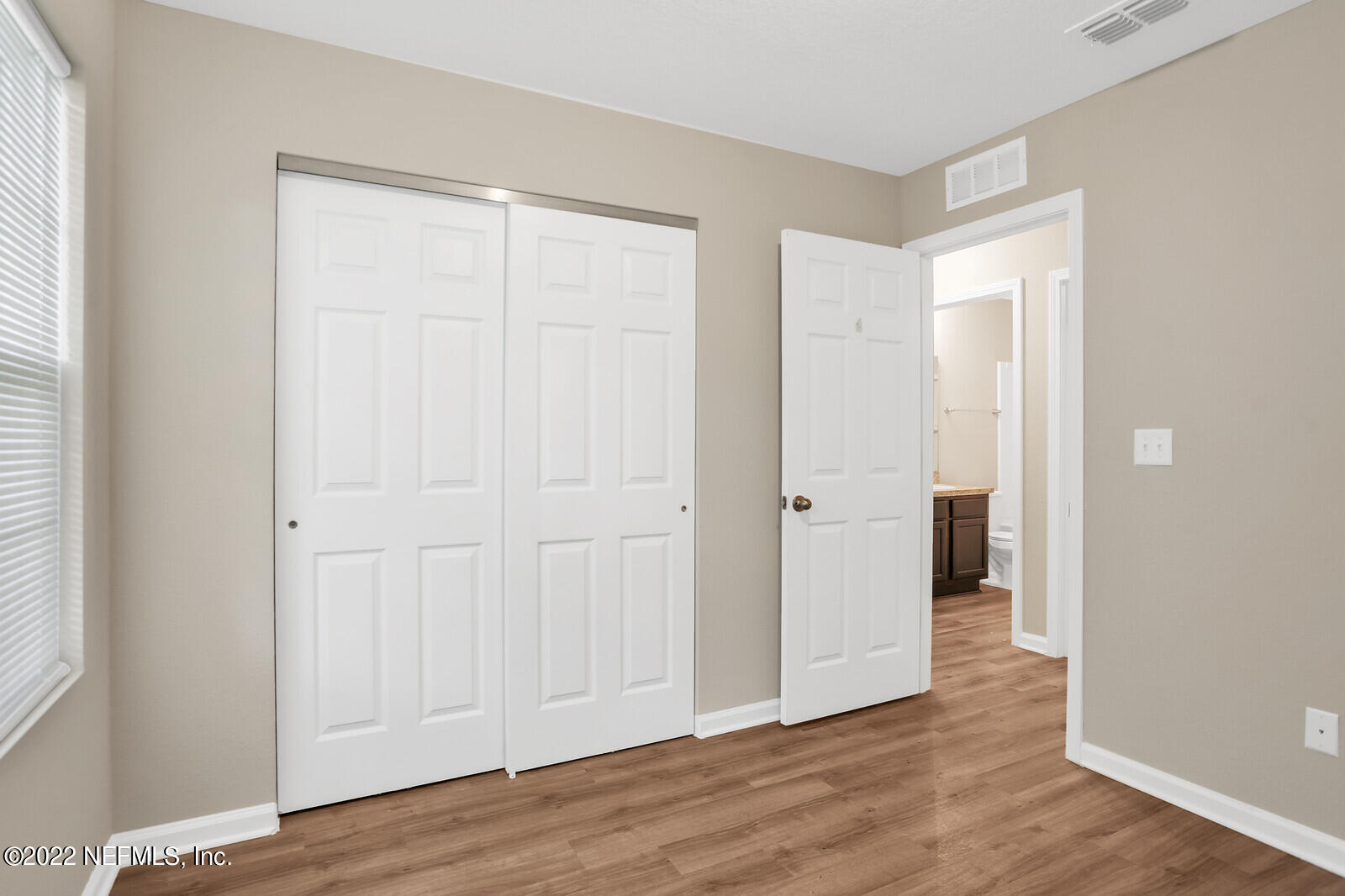 2235 3rd Avenue Jacksonville, FL 32208 - Photo 15 of 22 an empty room with wooden floor