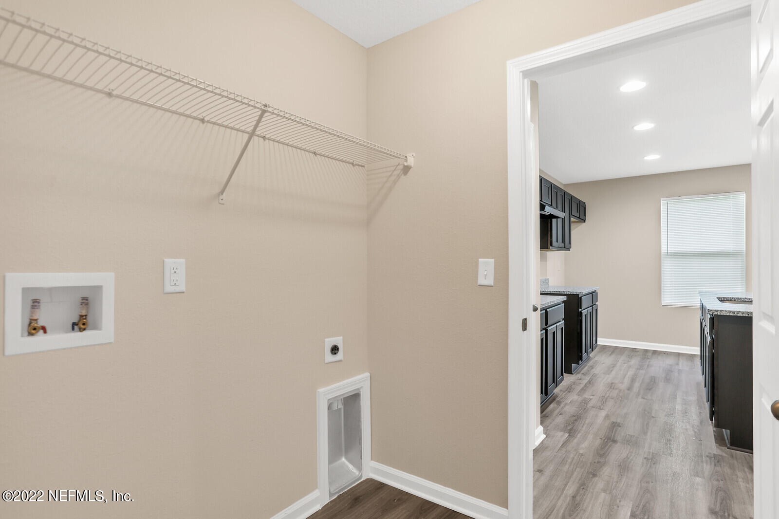 2235 3rd Avenue Jacksonville, FL 32208 - Photo 18 of 22 a view of hallway with furniture and wooden floor