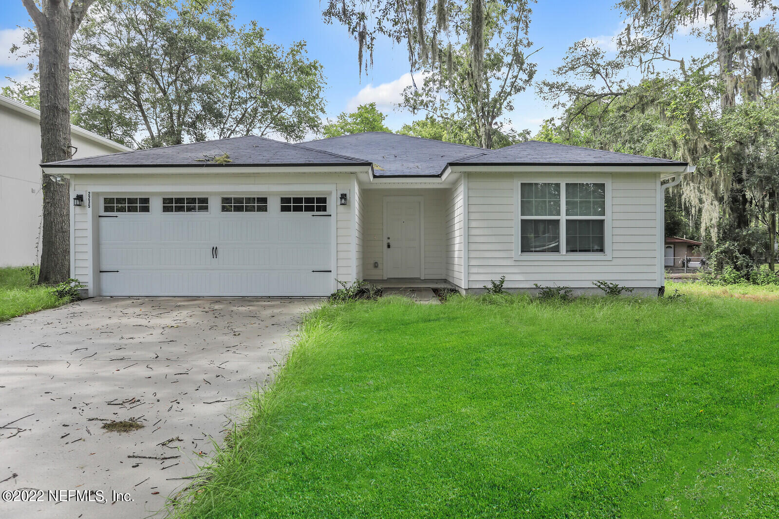 2235 3rd Avenue Jacksonville, FL 32208 - Photo 21 of 22 front view of house with a yard