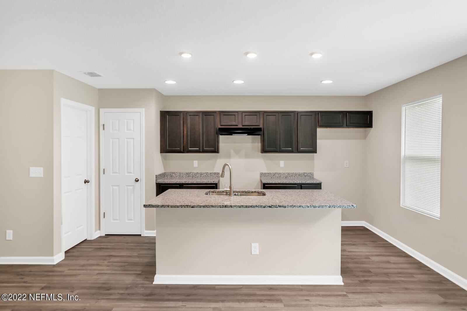 2235 3rd Avenue Jacksonville, FL 32208 - Photo 3 of 22 a view of kitchen with stainless steel appliances granite countertop refrigerator sink and cabinets