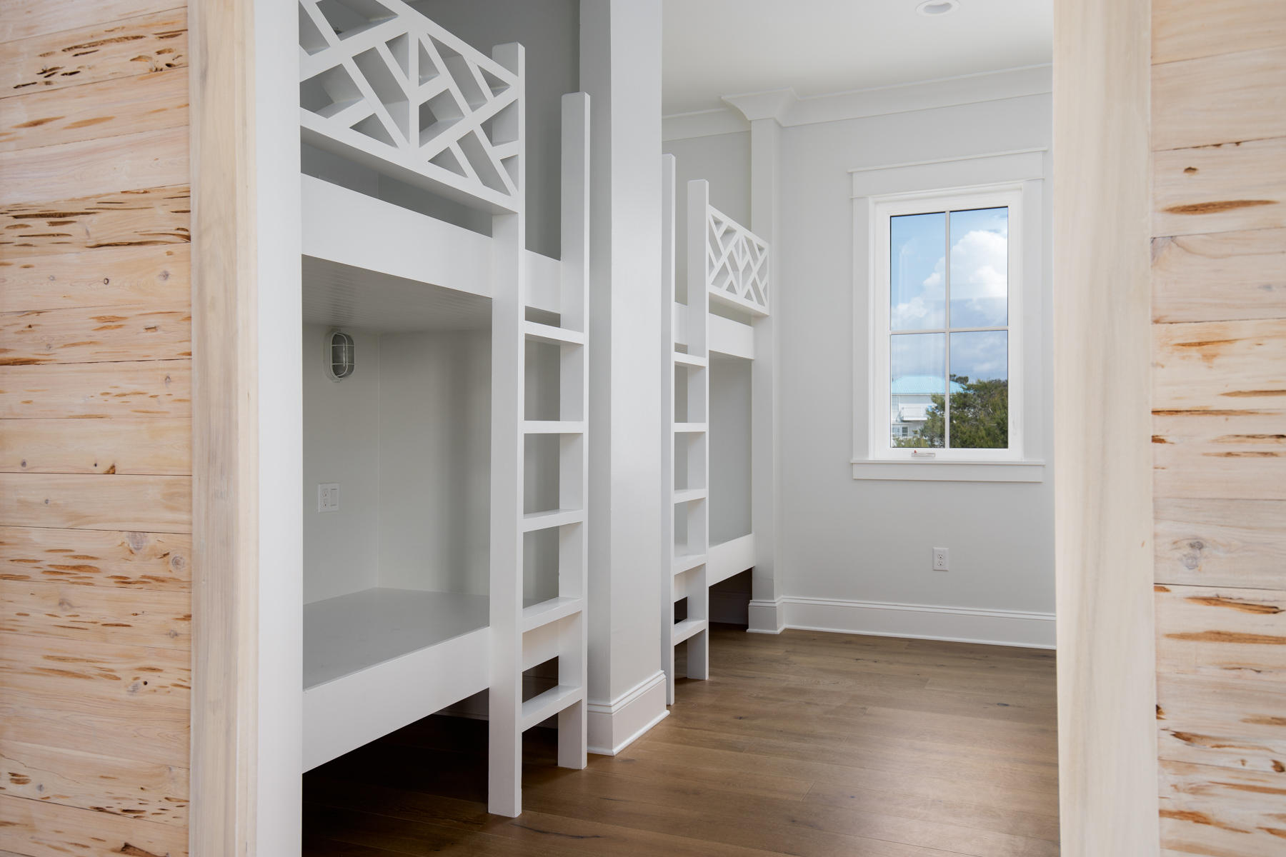 68 Baird Road Santa Rosa Beach, FL 32459 - Photo 13 of 30 a view of an entryway with wooden floor