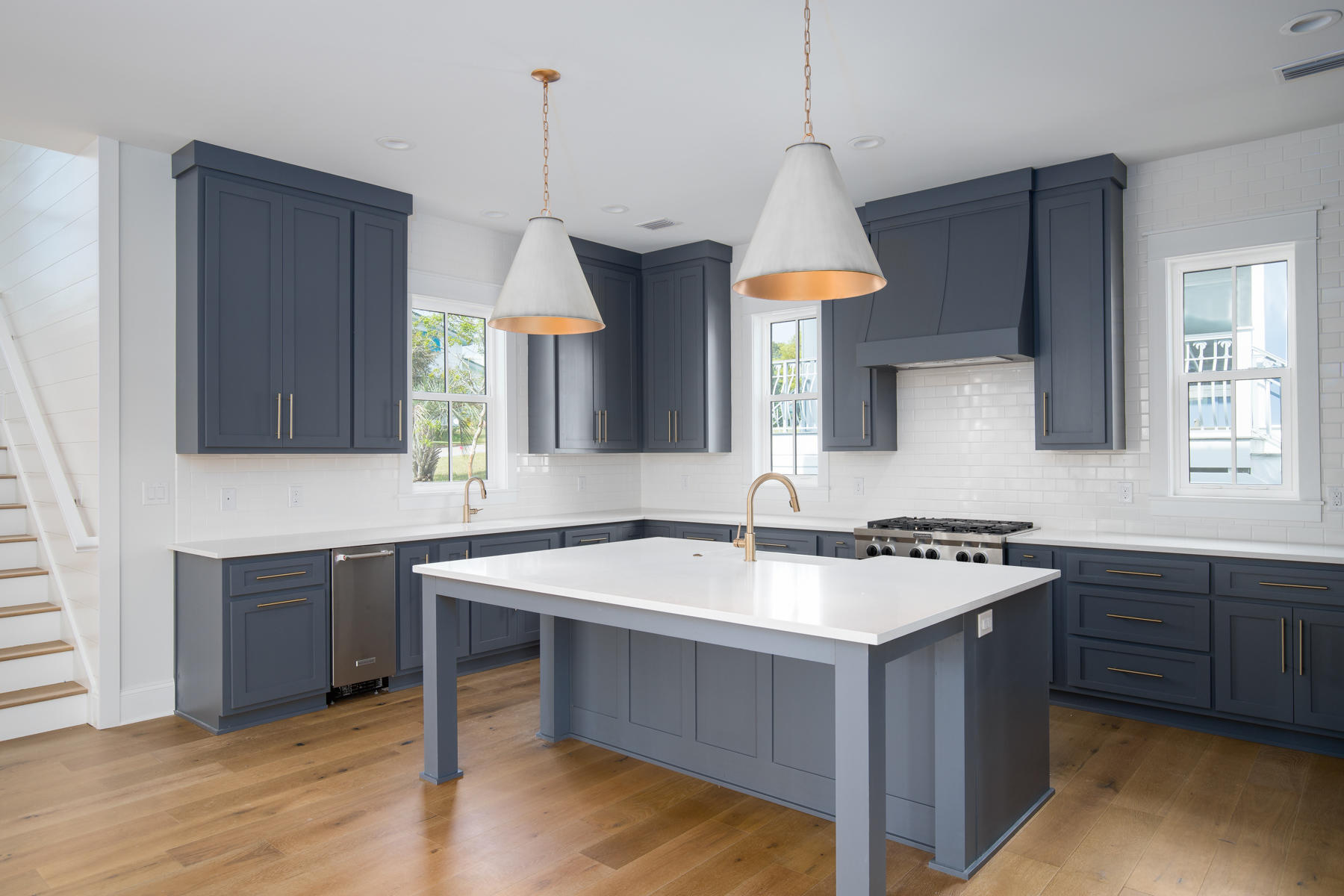 68 Baird Road Santa Rosa Beach, FL 32459 - Photo 5 of 30 a kitchen with a sink a counter space and a refrigerator