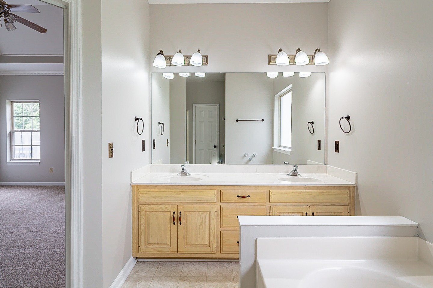 227 Beckwith Road Mount Juliet, TN 37122 - Photo 28 of 34 a spacious bathroom with a double vanity sink mirror and