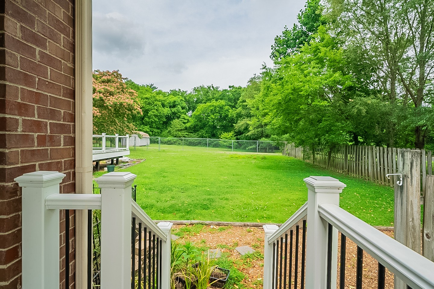 227 Beckwith Road Mount Juliet, TN 37122 - Photo 31 of 34 a view of a garden with a small yard