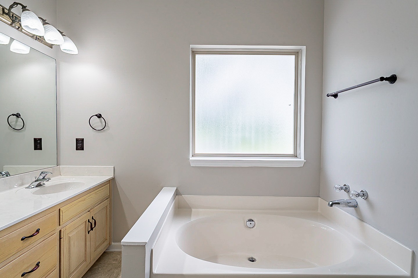 227 Beckwith Road Mount Juliet, TN 37122 - Photo 6 of 34 a bathroom with a tub sink and mirror