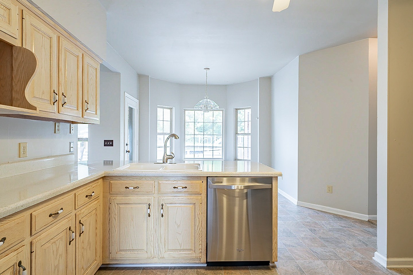 227 Beckwith Road Mount Juliet, TN 37122 - Photo 8 of 34 a kitchen with granite countertop a sink a window and cabinets